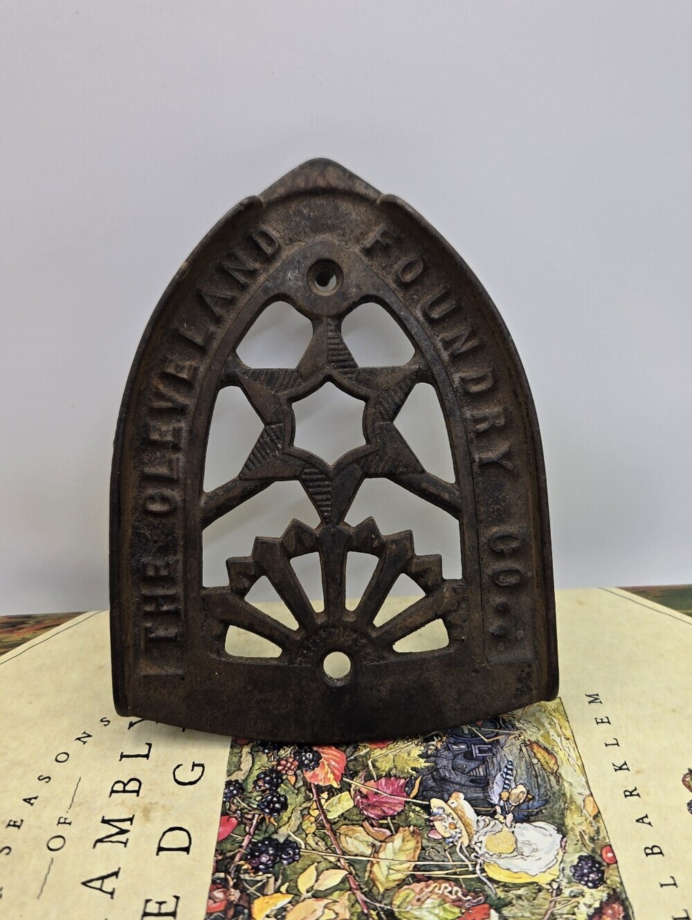Antique Cast Iron Trivet Manufactured by The Cleveland Foundry Co. in Ohio.